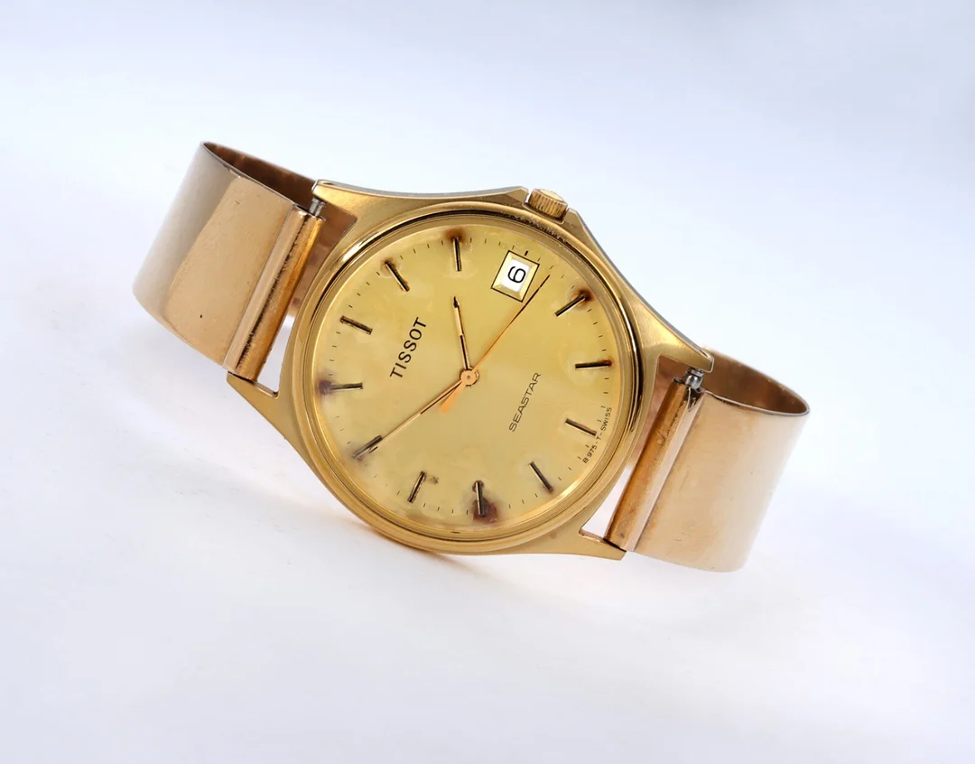 Tissot. 'Seastar' men's/unisex watch in gold-plated steel with bracelet of 14 kt. gold, 1980s — Watches and clocks/Men’s watches — Lauritz