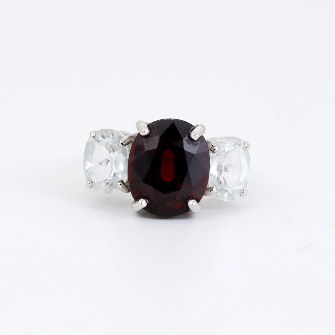 9CT WHITE GOLD GARNET AND WHITE STONES SET RING. — Rings — Chalkwell Auctions