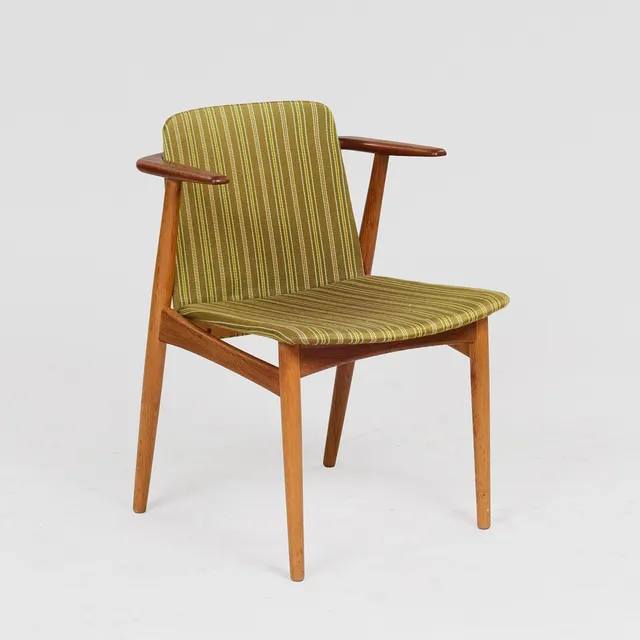 HANS OLSEN. Armstol af teak og eg, sæde og ryg betrukket med stribet stof, N. A. Jørgensens Møbelfabrik, Danmark, formgivet 1955.