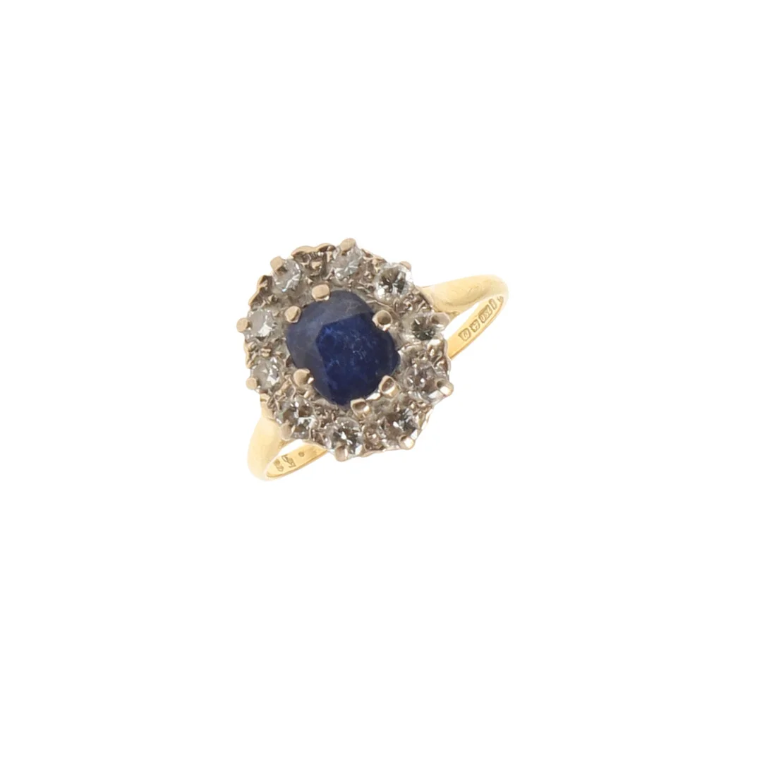 A SAPPHIRE AND DIAMOND CLUSTER RING. — Rings — Lawrences Auctioneers
