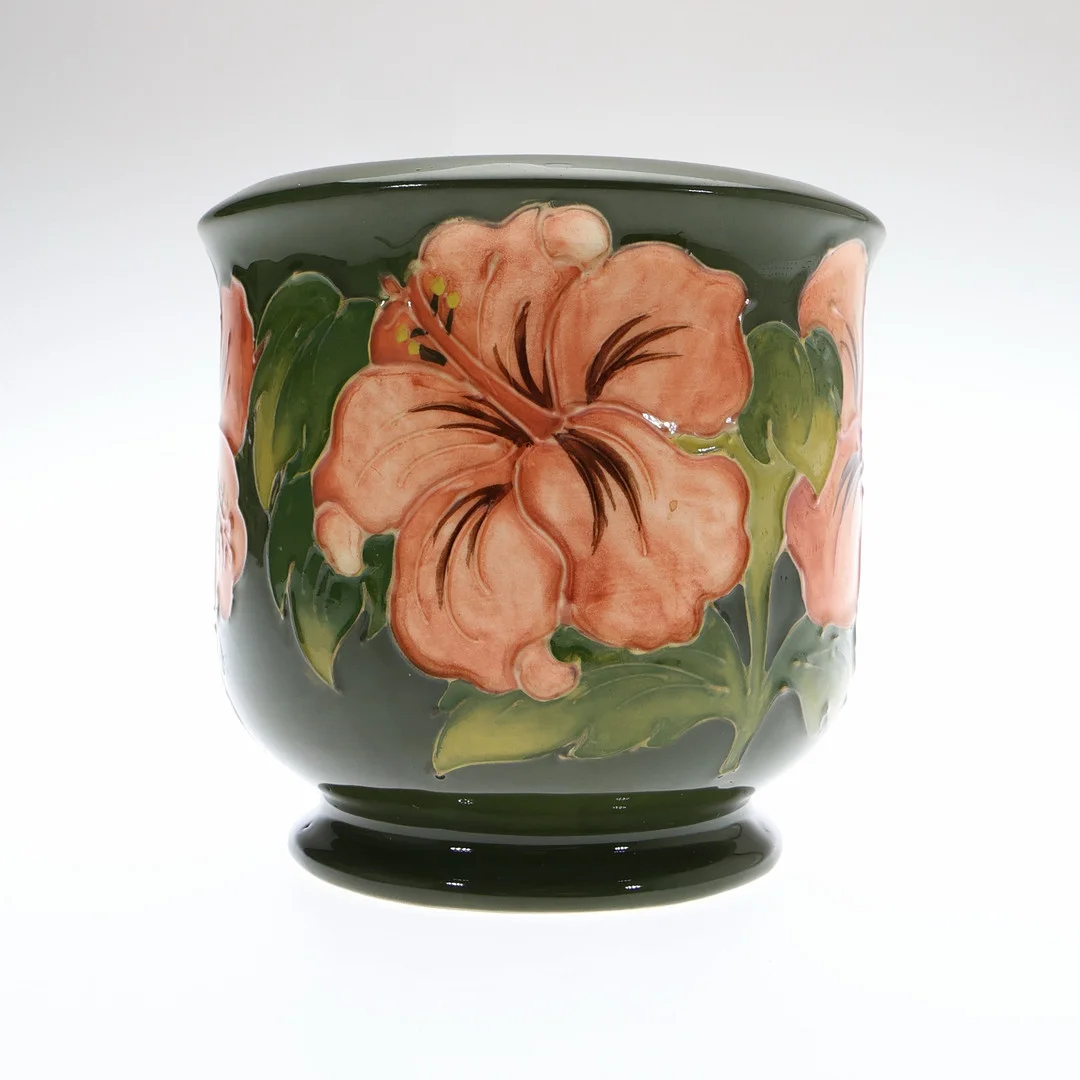 WALTER MOORCROFT HIBISCUS PATTERN CACHE POT. — European — Young's Auctions