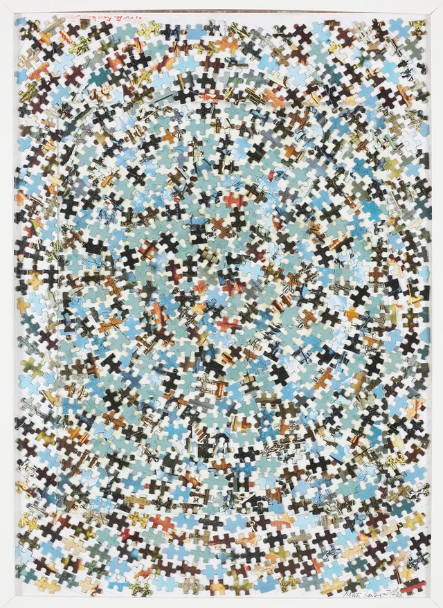MÄRTA REUTERSWÄRD. "The puzzle of life", pannå med applikation i form av pusselbitar, signerad.