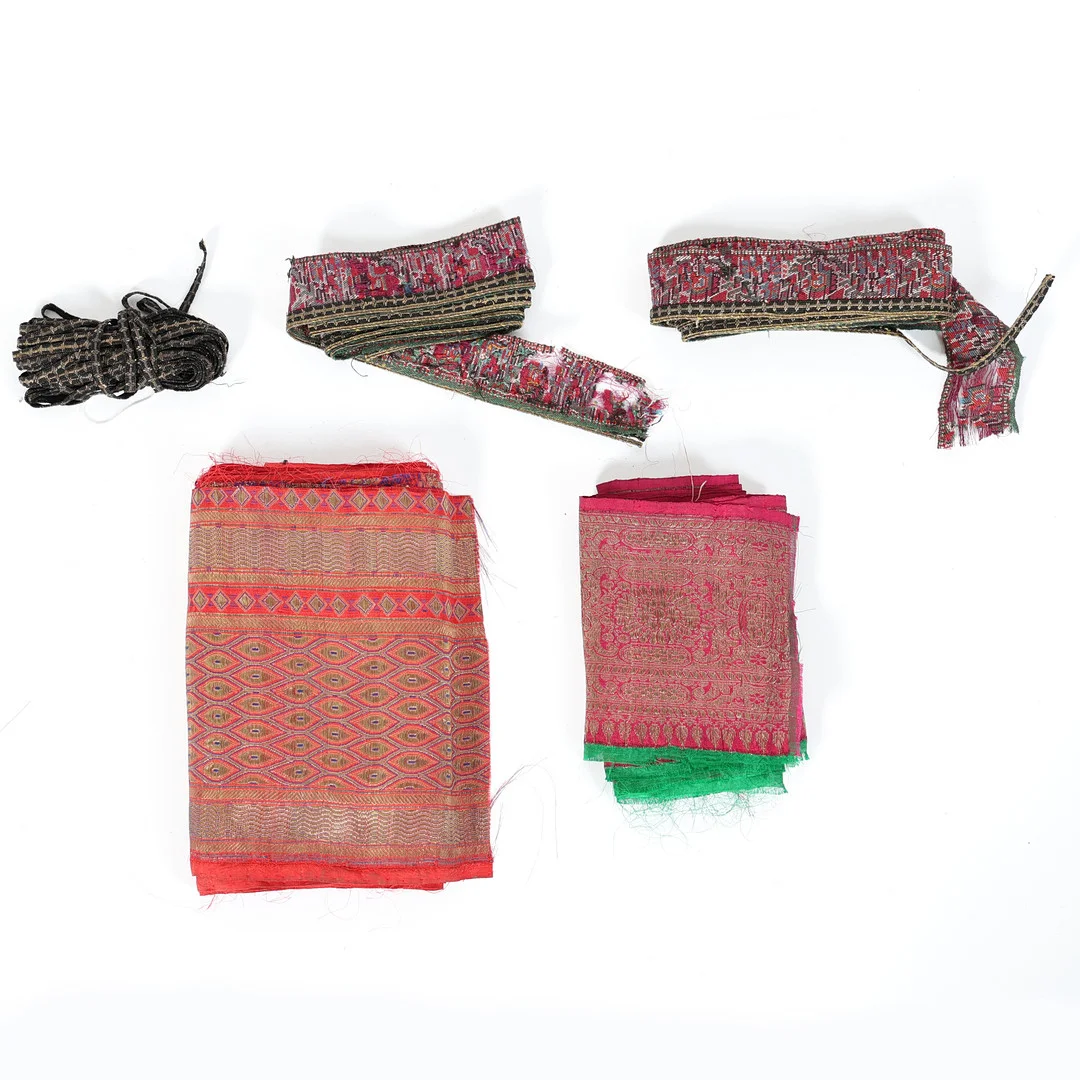 A QUANTY OF INDIAN SILK SARI BORDERS AND RIBBONS EARLY 20TH CENTURY AND LATER (5). — Textiles — Bishop & Miller