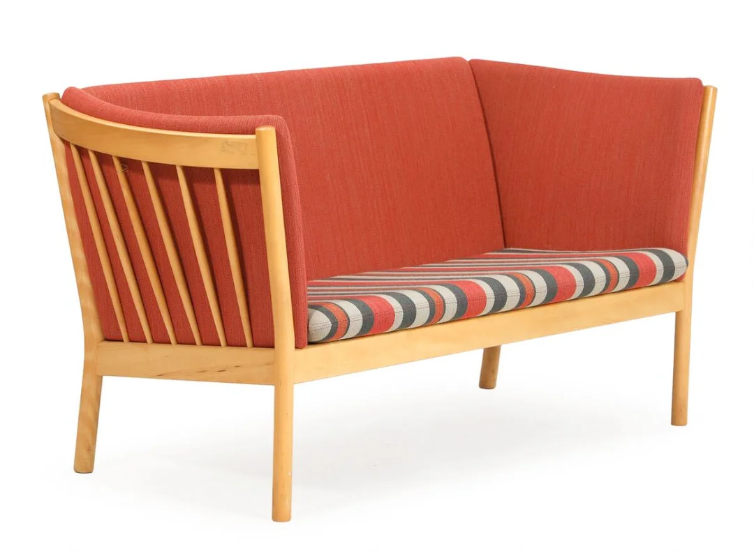 A two-seater beech sofa with loose cushions upholstered with reddish and striped wool. Model J48. Manufactured for FDB. L. 150 cm. — Modern Furniture — Bruun Rasmussen