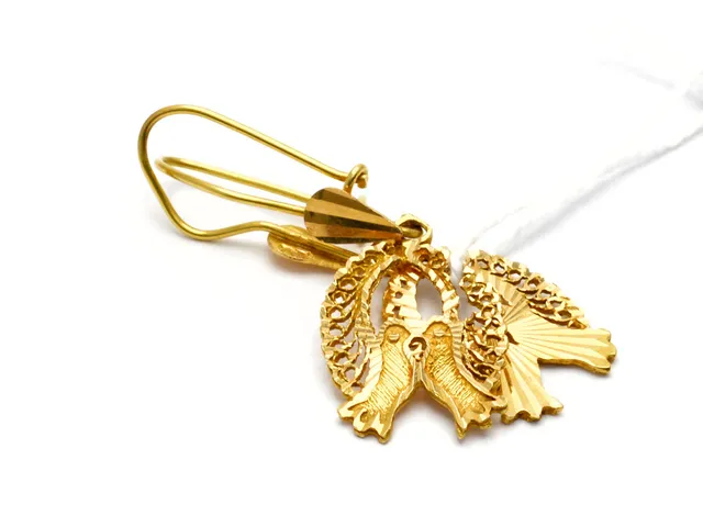 Örhängen 18K 3,2g, buckliga