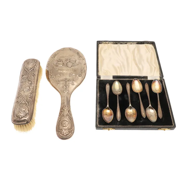 SIX COFFEE SPOONS, A CLOTHES BRUSH AND A HAND MIRROR.