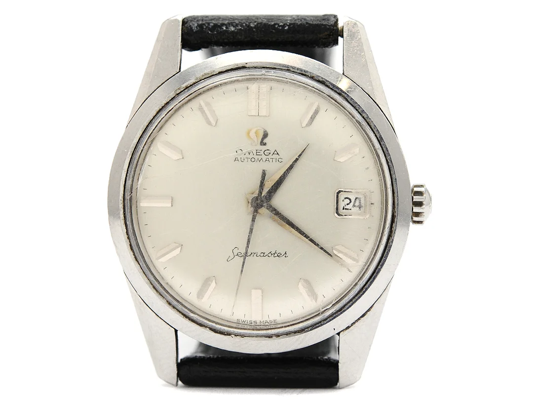 OMEGA, Seamaster, Cal 562, Serie nr. 18186231, Ref nr. CK 14701, Boett nr. 14701 1 SC, herrur, 33,5 mm, stål, automatisk, plexiglas, datum, skadad urtavla, läderband, ca 1961. — Klockor/Omega — Kaplans