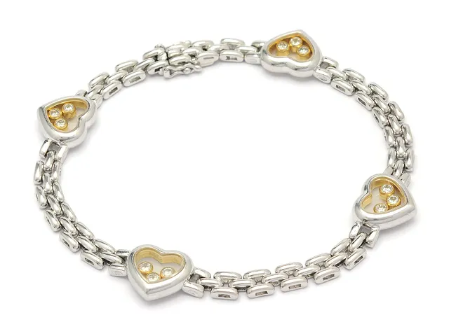 CHOPARD, armband, Happy diamonds, 18K vitguld, 12 briljantslipade diamanter ca 0,48 ctv, längd 19 cm, vikt 25 g.