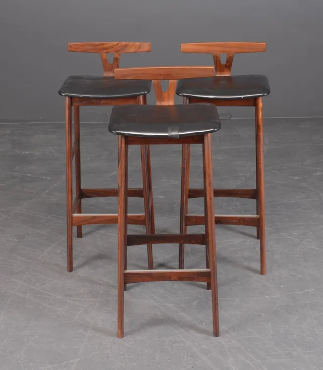 Erik Buch. Three rosewood barstools. (3)