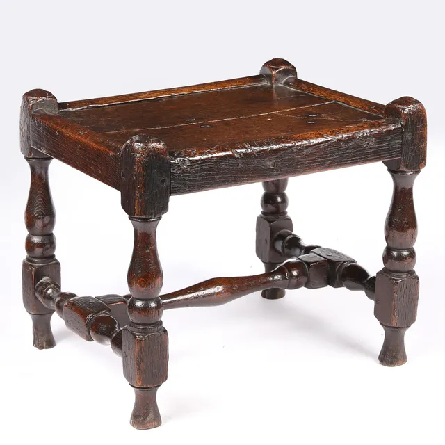 AN UNCOMMON WILLIAM & MARY JOINED OAK STOOL, CIRCA 1690.