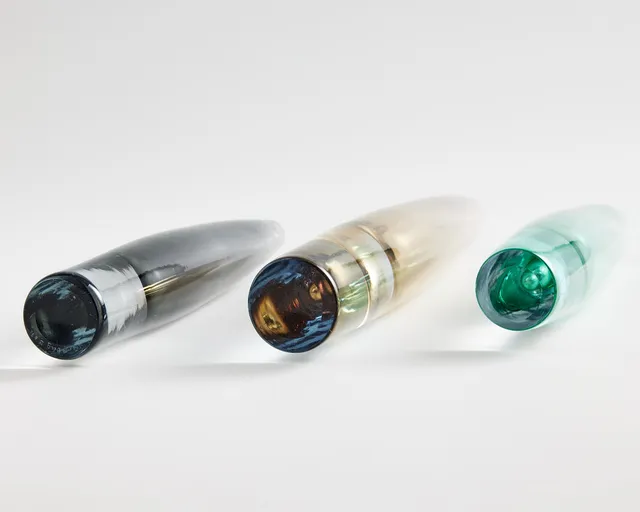ASTA STRÖMBERG. “Sputnik”, 12 vases, Strömbergshyttan, 1960s, glass with underlays in purple, green, grey and brown shades.