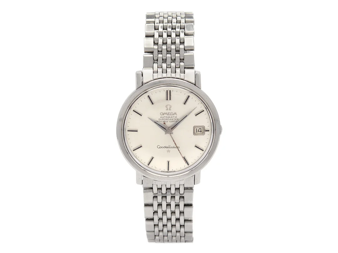 OMEGA, Constellation, Chronometer, Cal 561, Serie nr. 23051497, Ref nr. ST 168.004, Boett nr. ST 168.004. herrur, 35,5 mm, stål, automatisk, plexiglas, datum, originallänk, viklås, Ref nr. 1037/70, ”Extract of the Archives”, tillverkad 18/5 1966, levererad till Sverige. — Klockor/Omega — Kaplans