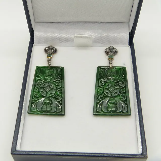 LARGE CARVED JADE EARRINGS.