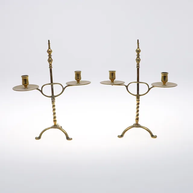 A PAIR OF BRASS ADJUSTABLE CANDELABRA.