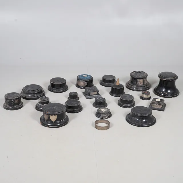 A QUANTITY OF TROPHY BASES.