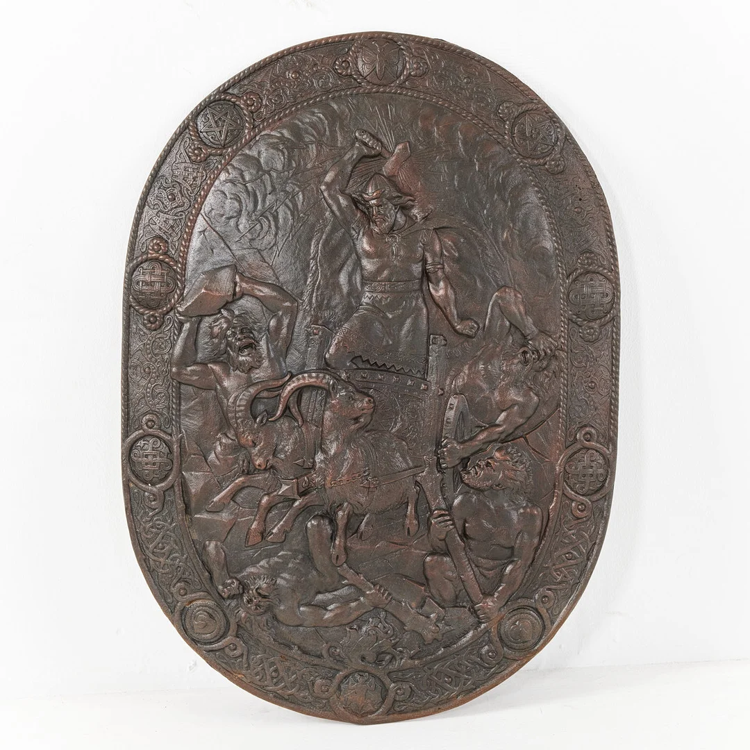 SKÖLD, 1900-talets första hälft, "Tors strid med jättarna" (efter M E Winges målning), bronserat gjutjärn, i gjutningen märkt G E samt 1890. — Other collectables — Stockholms Auktionsverk Magasin 5