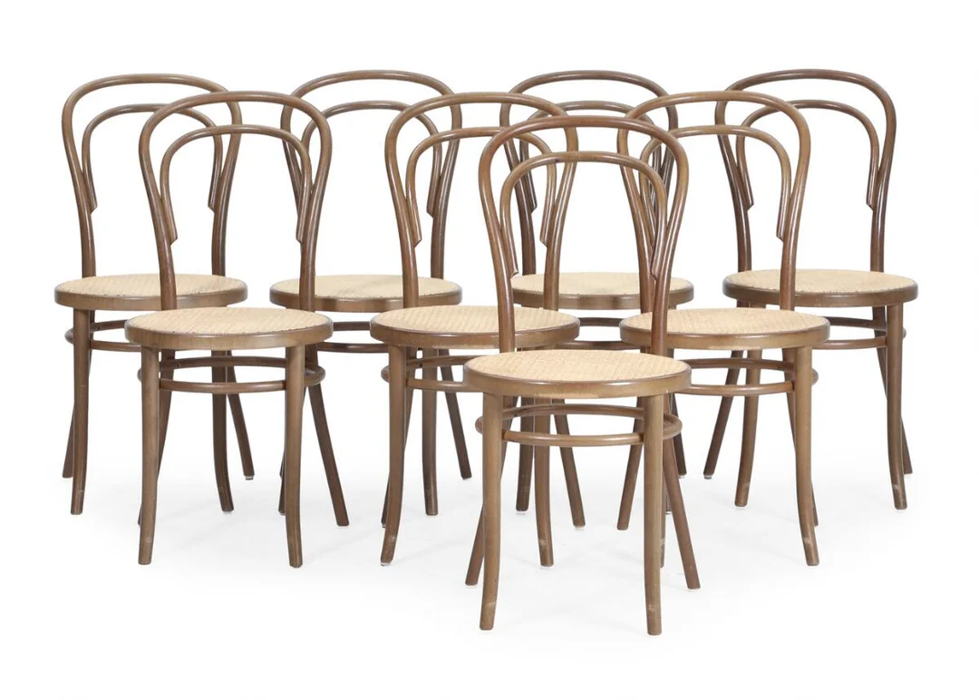 “No. 14”. Eight dark stained bentwood chairs, seats with French cane. Manufactured and marked by Fameg. (8) — Modern Furniture — Bruun Rasmussen