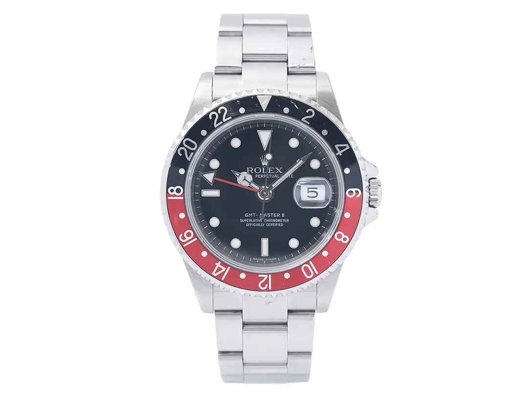 ROLEX, Oyster Perpetual Date, GMT-Master II (Swiss Made), Chronometer, s.k. "Roman Dial", "3186 Caliber", Ref nr. 16710 T, Serie nr. M317136, Cal 3186, Verk nr. 3 1873821, Boett nr. 2180, herrur, 40 mm, stål, automatisk, safirglas (skadat), 24-timmarsvisning, Oysterlocklänk, viklås, Ref nr. 78790A-EO10, cert, april 2008, box, ytterkartong. — Klockor/Rolex — Kaplans