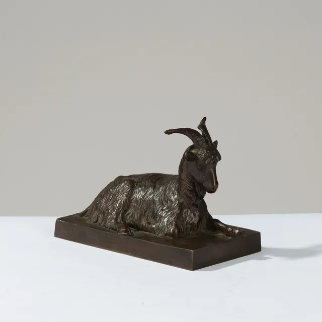 VILHELM BISSEN (1836-1913). TILSKREVET. Liggende ged af patineret bronze, usigneret, 1800 tallets anden halvdel.