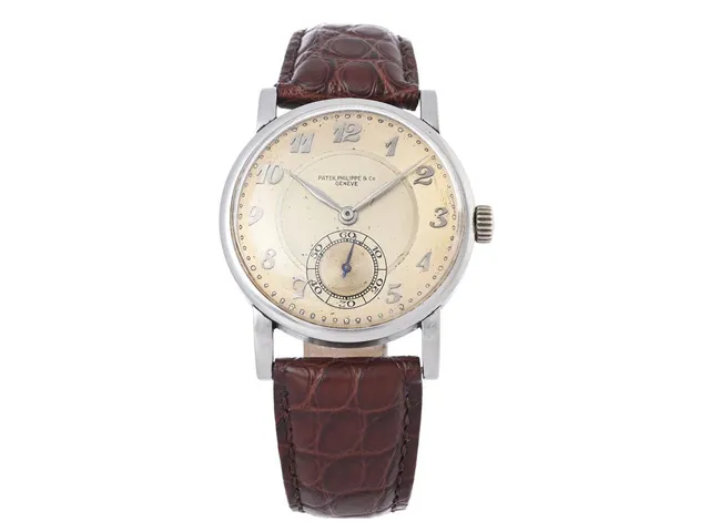 PATEK PHILIPPE & Co, Genève, herrur, 35,5 mm, Cal 12-120, Serie nr. 923104, Ref nr. 1504, Boett nr. 625053, stål (Staybrite), manuell, plexiglas, liten sekundvisare, läderband, "Extract from the Archives", såld mars 1943.
