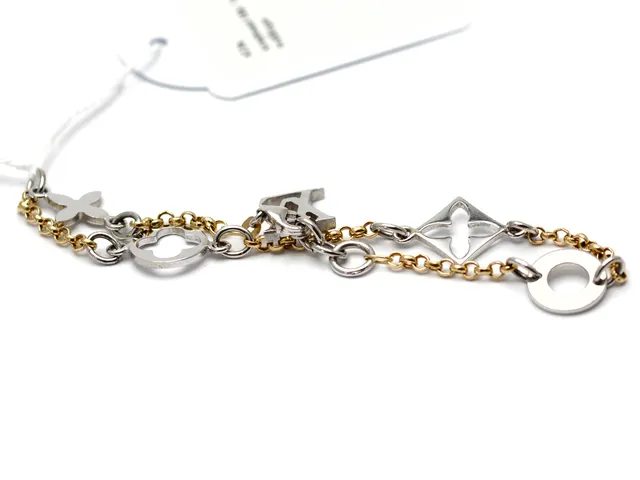 Armband 18K 7,8g 20cm tvåfärgat