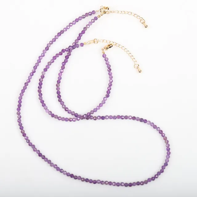 COLLIER SAMT ARMBAND, förgyllt silver med ametister.