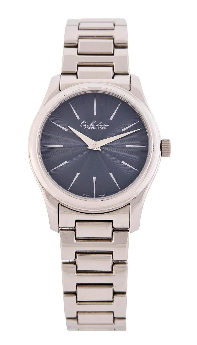 Heritage of steel, ref. OM2.34Q1.HE. Quartz movement, cal. ETA. Circumference approximately 19 cm. Ø 34 mm. 2024. — Clocks & watches/Wristwatches — Bruun Rasmussen