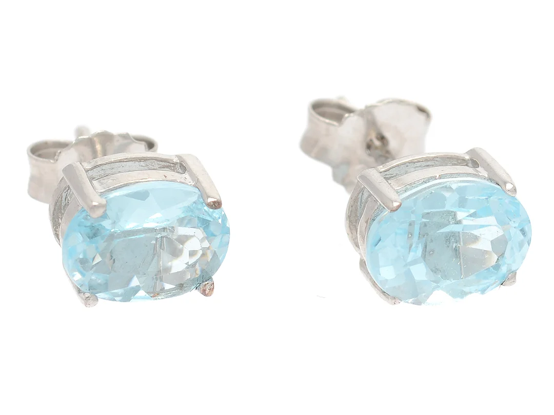 ÖRHÄNGEN, ovala fasetterade topaser ca 8x6mm, sterlingsilver stift, vikt 2g. — Smycken/Örhängen — Kaplans