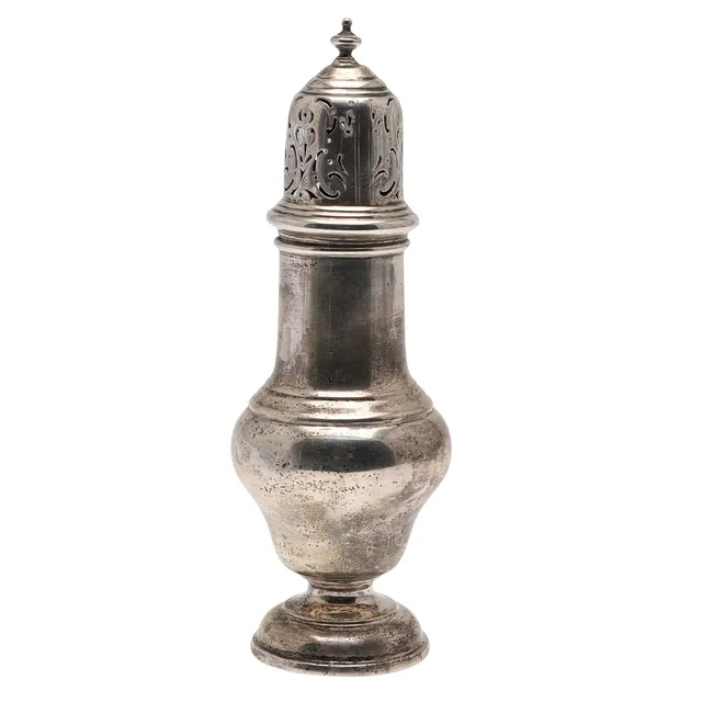 A GEORGE V SILVER SUGAR CASTER.