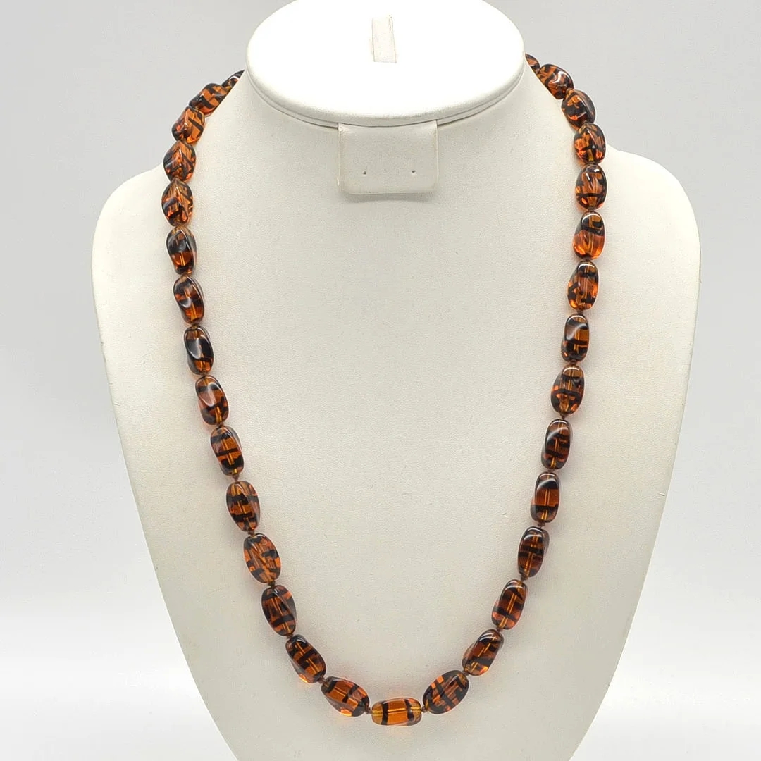 MURANO GLAS COLLIER, BERNSTEINFARE MIT SCHWARZEN STREIFEN, STUDIOGLAS, VERGOLDETER VERSCHLUSS, 20. JAHRHUNDERT. — Necklace — Kunst- und Auktionshaus Kleinhenz