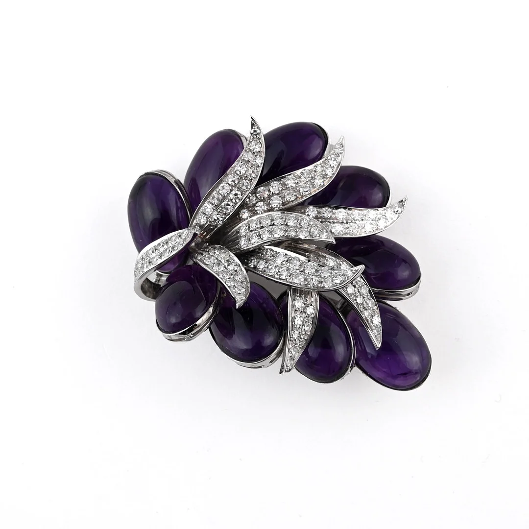 AN AMETHYST AND DIAMOND FOLIATE BROOCH. — Brooches & Pendants — Lawrences Auctioneers
