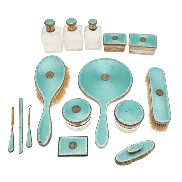 A QUANTITY OF GEORGE V SILVER AND BLUE ENAMEL DRESSING TABLE ITEMS BY WILLIAM COMYNS & SONS LTD.