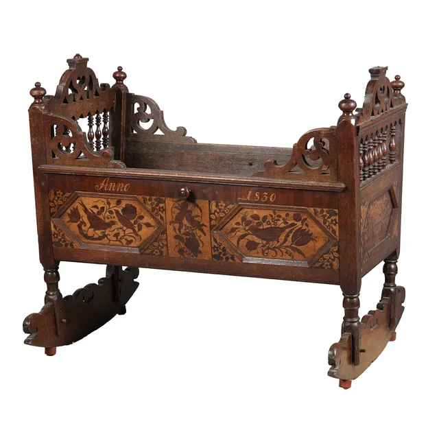 A CONTINENTAL INLAID CHILDS CRIB.