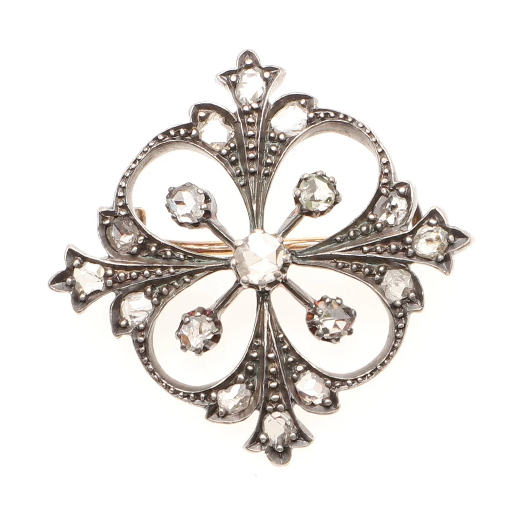 A LATE VICTORIAN DIAMOND QUATREFOIL BROOCH. — Brooches & Pendants — Lawrences Auctioneers