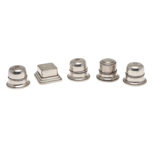 FOUR SILVER RING BOXES AND A SILVER PLATED RING BOX.