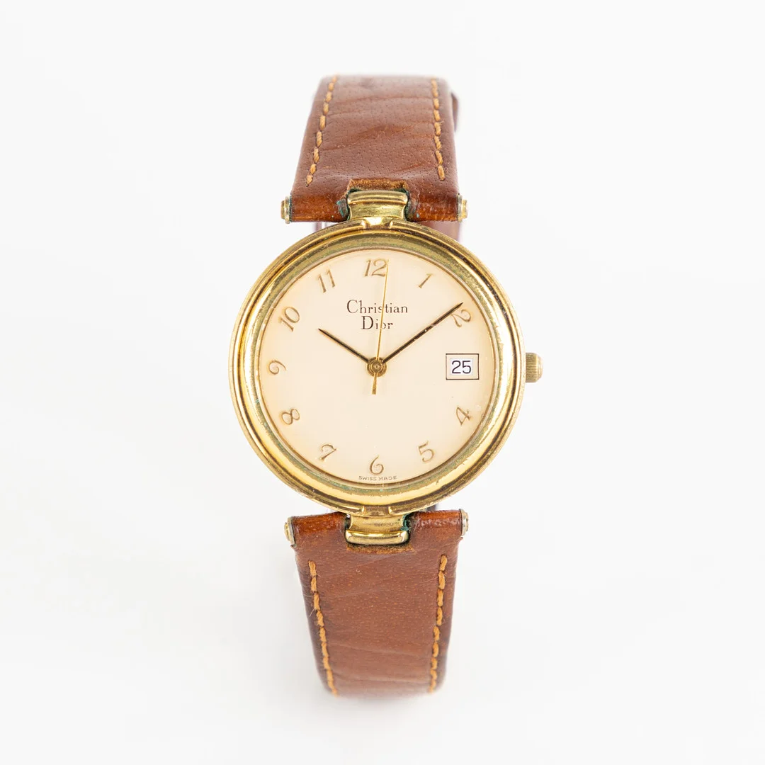 CHRISTIAN DIOR. 32 mm, guldpläterad, 80/90-tal. — Wristwatches — Karljohan Auktioner