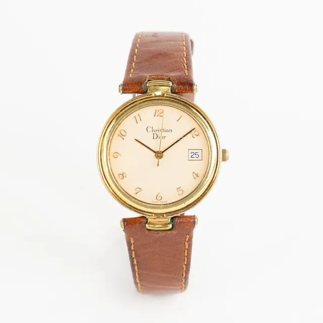 CHRISTIAN DIOR. 32 mm, guldpläterad, 80/90-tal.