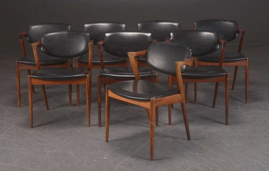 Kai Kristiansen. Eight armchairs / dining chairs made in rosewood, model 42 (8) — Furniture/Chairs — Lauritz