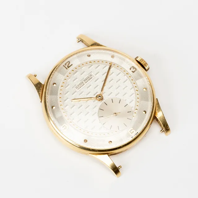ULYSSE NARDIN. Locle Suisse, armbandsur, texturerad urtavla, manuell, boett av 18K guld, 1950-tal.