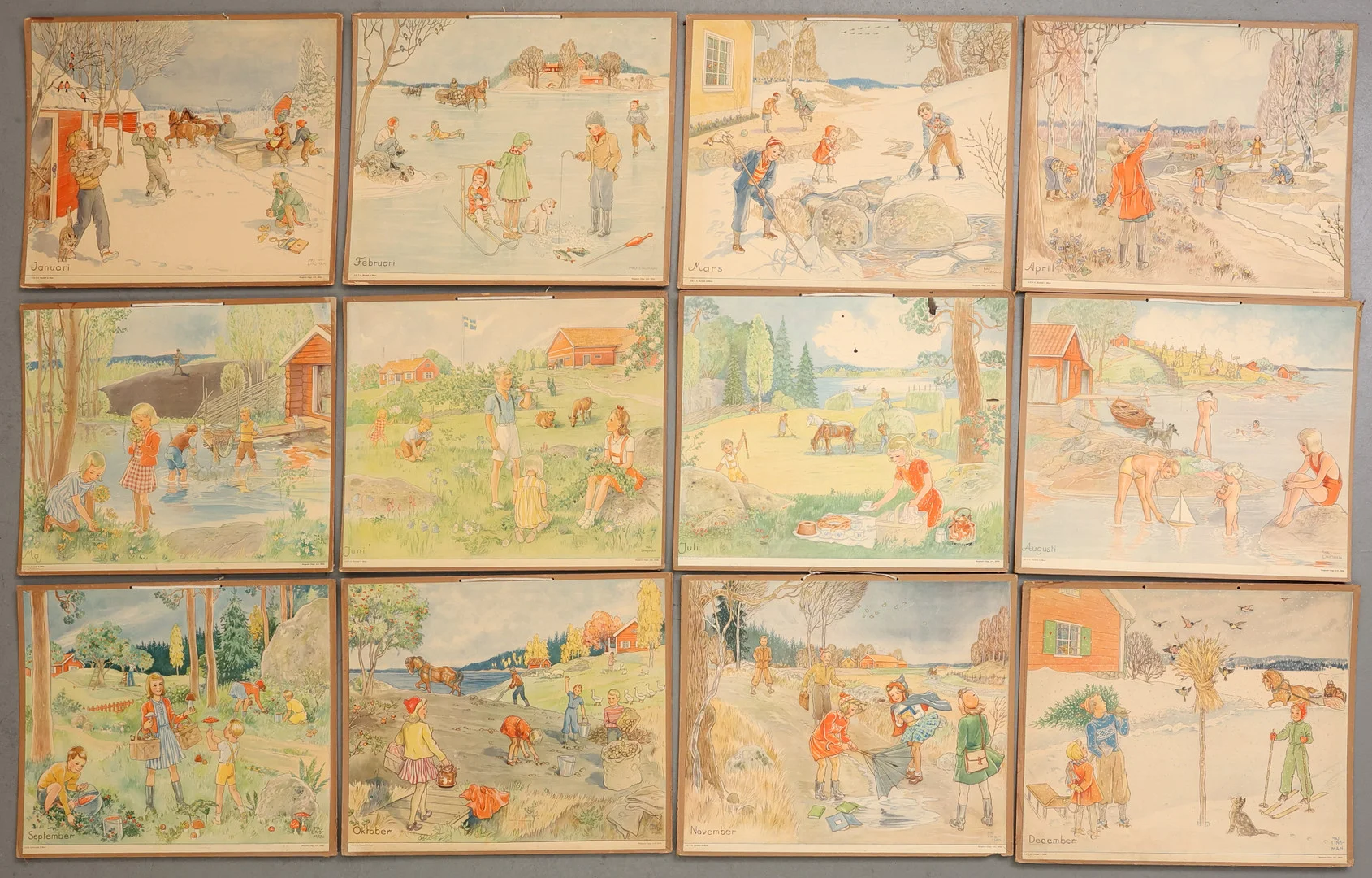 MAJ LINDMAN (1886-1972). Skolplanscher, 12 st, jan till dec, offsettryck, signerade i tryck. — Engravings & Prints — Garpenhus Auktioner