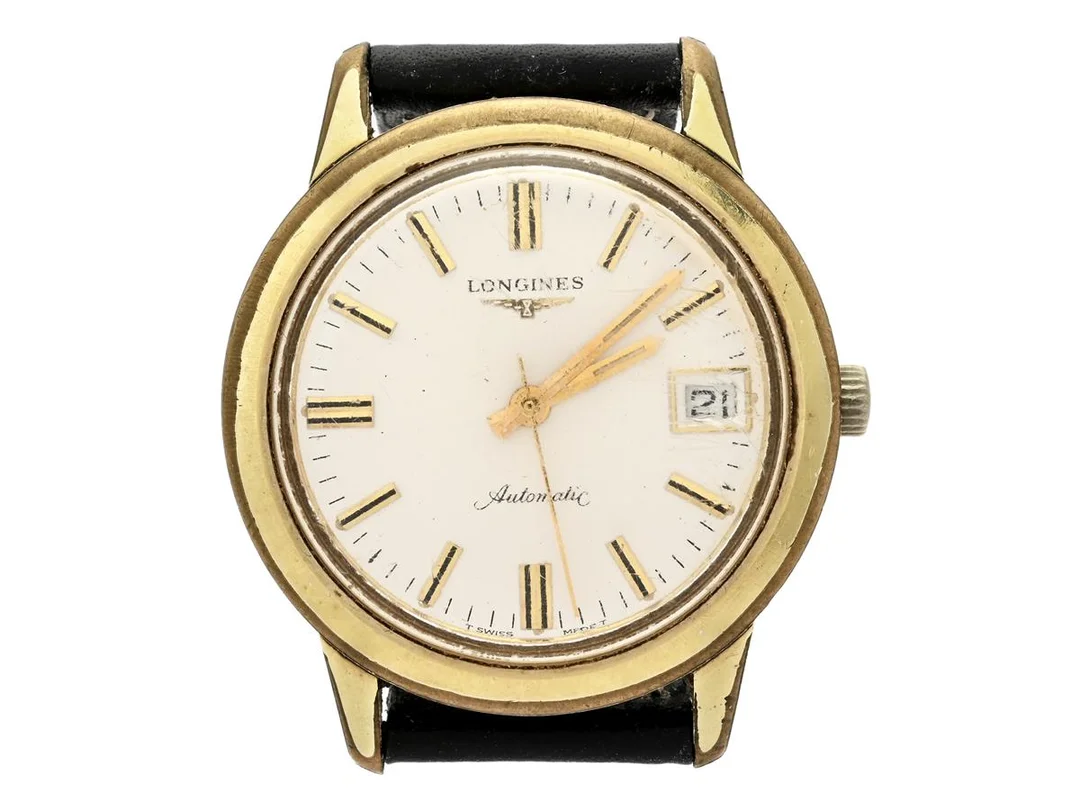LONGINES, herrur, 3594 mm, Cal 506, Serie nr. 51658094, Boett nr. 16887543/1501, doublé (skadad, 20 micron), automatisk, plexiglas, datum, skadad urtavla, defekt (akut servicebehov), gravyr, läderband, ca 1970. — Klockor/Longines — Kaplans