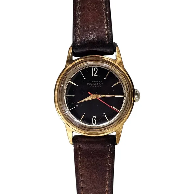 JUNGHANS TRILASTIC, 17 Rubíes. Reloj de pulsera con caja en acero y plaqué de oro amarillo. Mecanismo mecánico a cuerda.