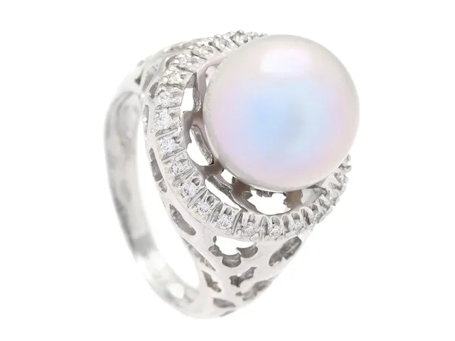 RING, 18K vitguld, odlad pärla ca 11,5 mm, briljantslipade diamanter ca 0,20 ctv, ca TW-W/VS-SI, stl 17,5 mm, vikt 8,6 g.