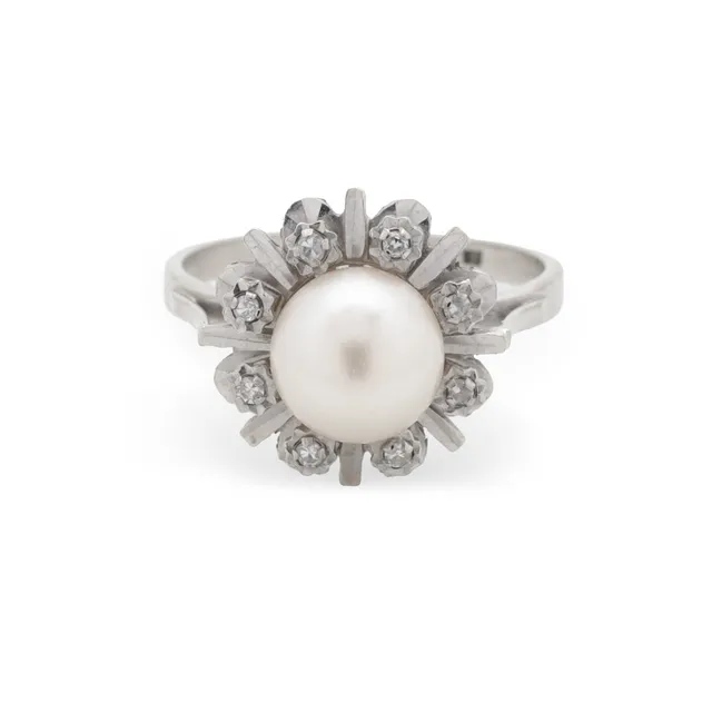 Ring af 14 kt hvidguld, med perle og sten.