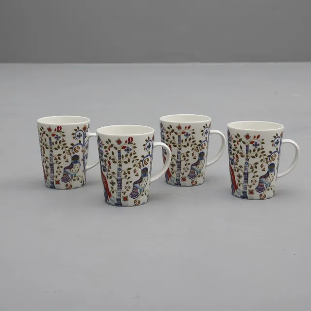 HEIKKI ORVOLA. servisdelar 8st Iittala "Taika" muggar med fat.