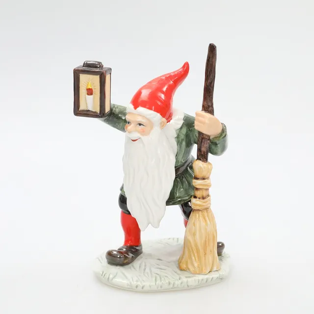 JENNY NYSTRÖM. EFTER. Figurin,numrerad 292/2000, Tomte med lykta och kvast , Jenny Nyströms minne,Kalmar Läns Museum.