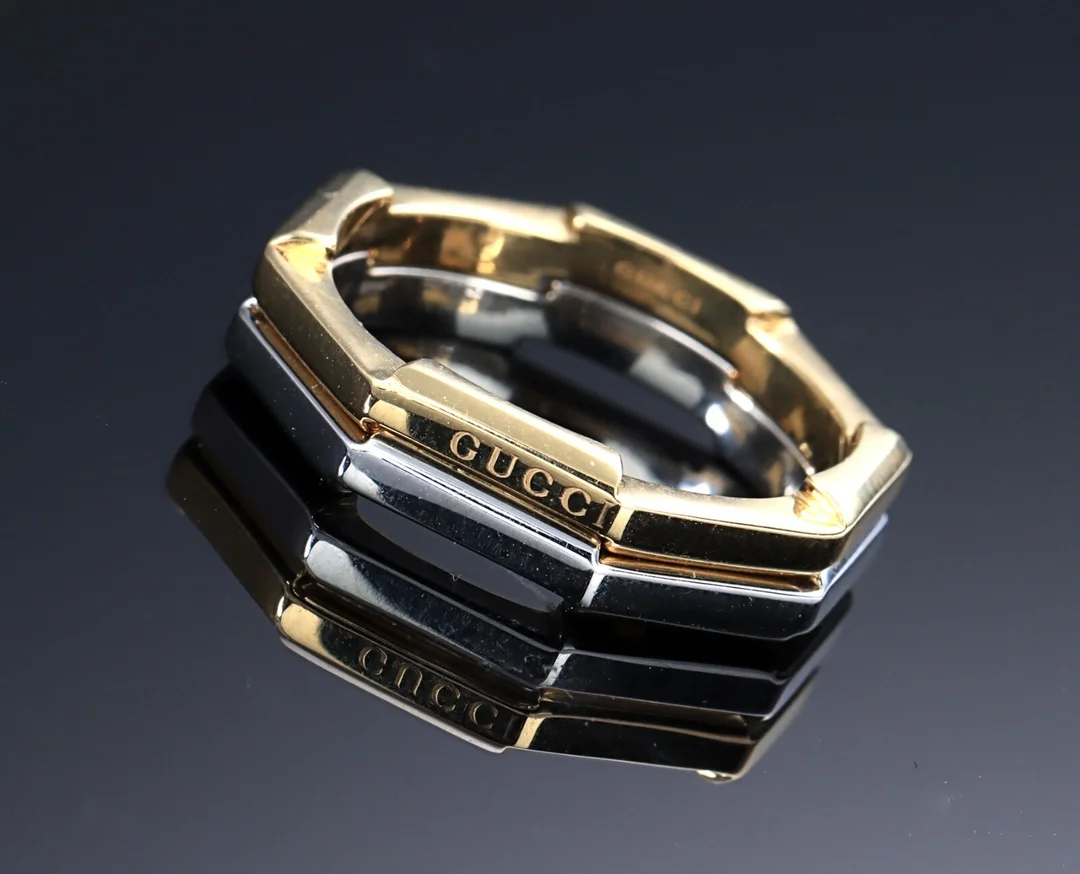GUCCI. 'Link To Love' ringe af 18 kt. guld og platin (2) — Jewellery/Rings — Lauritz