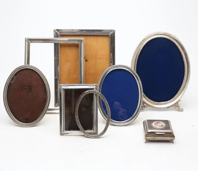 Six frames and box in silver, 20th Century.