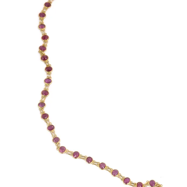 9CT RUBY SET NECKLACE.