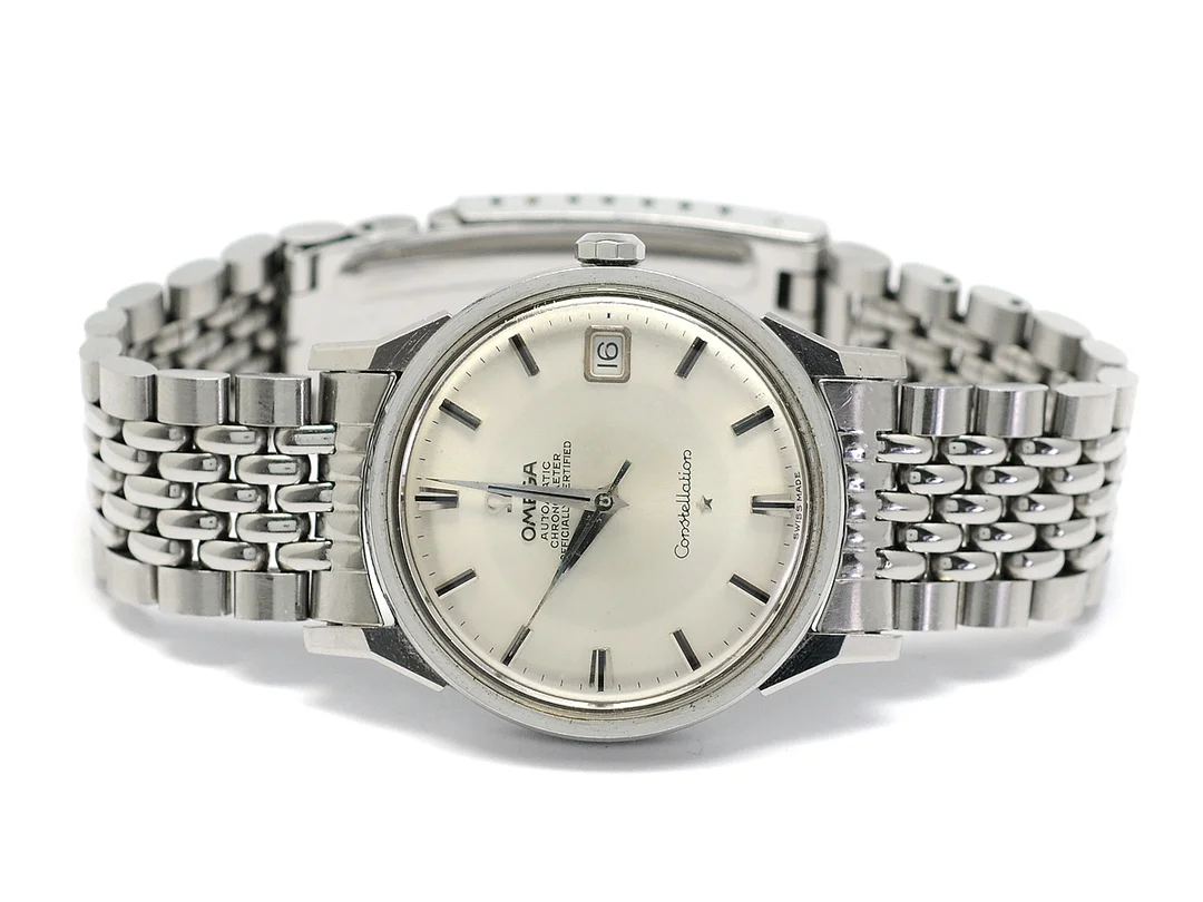 OMEGA, Constellation, Calendar, Chronometer, Cal 561, Serie nr. 24492224, Ref nr. ST 168.0005, Boett nr. 168.005, herrur, 34,2 mm, stål, automatisk, plexiglas, skadad urtavla, originallänk, viklås, Ref nr. 1036-8-74, ca 1966. — Klockor/Omega — Kaplans